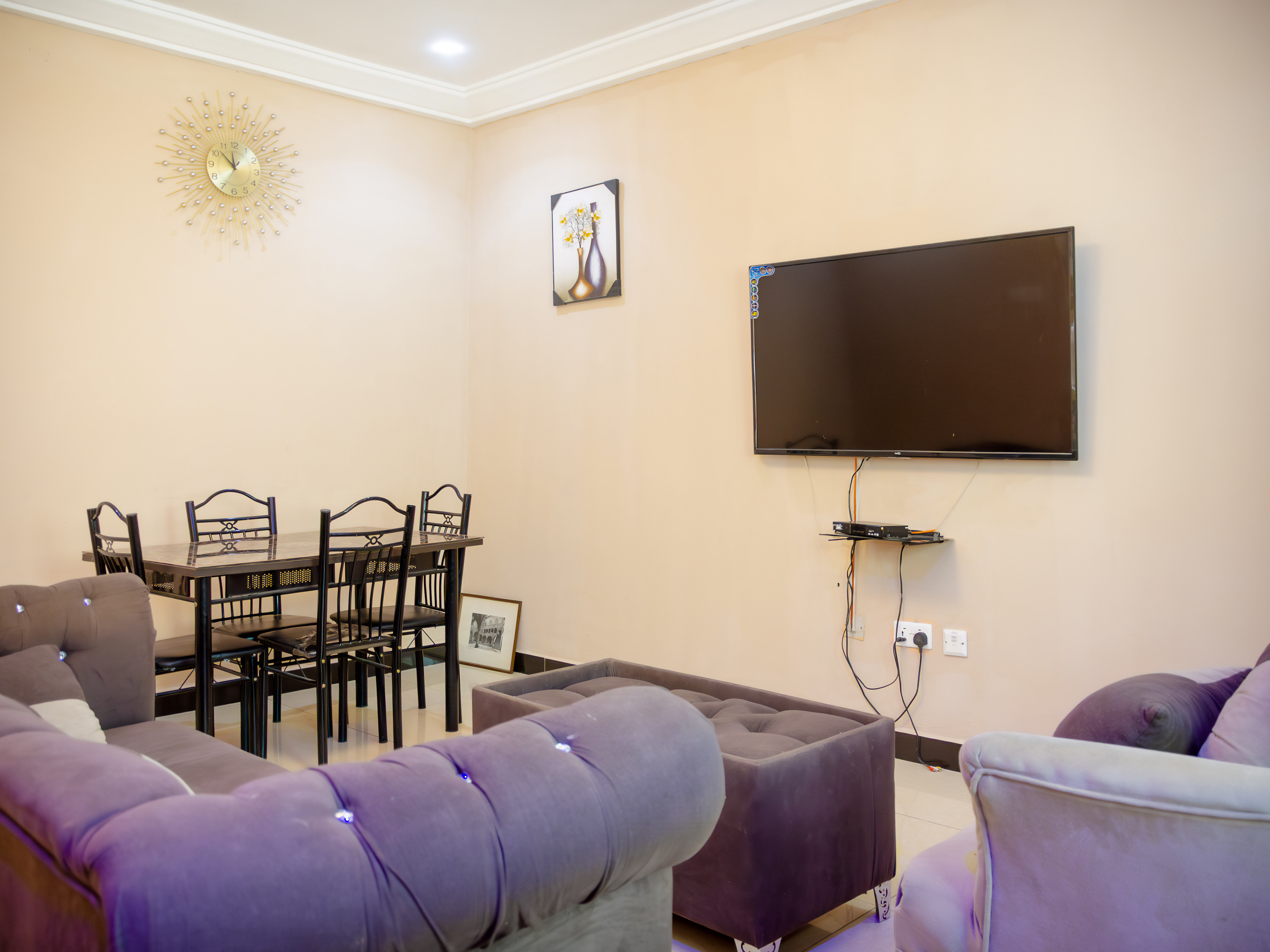 sitting room with two pairs of chairs
